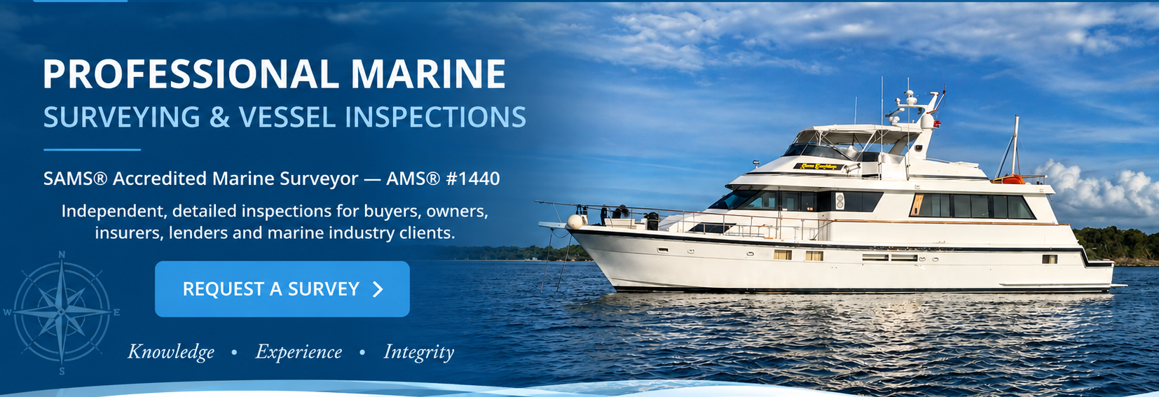 White motor yacht on blue water under a bright sky